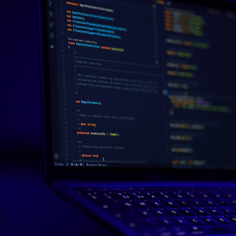 black laptop computer turned on displaying blue screen